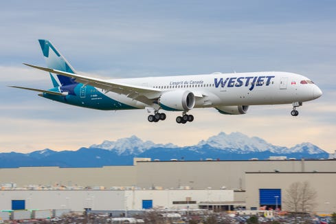The first Boeing 787 due to Canadian low-cost airline WestJet lands at Boeing's factory in Everett, Washington, after its first flight on Jan. 5, 2019.