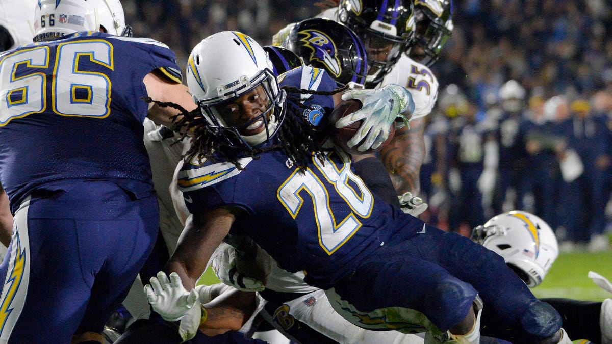Los Angeles Chargers running back Melvin Gordon (28) dives in for a third quarter touchdown  against the Baltimore Ravens at StubHub Center.
