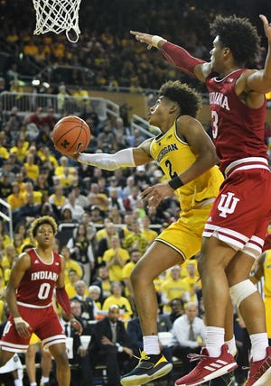 Michigan's Jordan Poole (2) has scored at least 17 points in six of the past nine games.