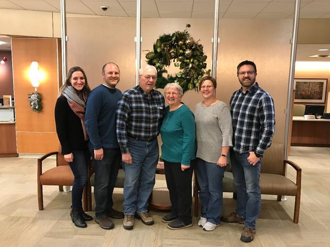 Bob and Susan Manzke with their family (from left) Rachel, Russ, Rebecca, and Rob at the oncologist's office.