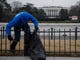 Workmen from the commercial cleanup company 1-800-GOT-JUNK clean up trash on The Ellipse, south of the White House, in Washington, DC on Jan. 4, 2019. The company donated resources to clean up the area.
