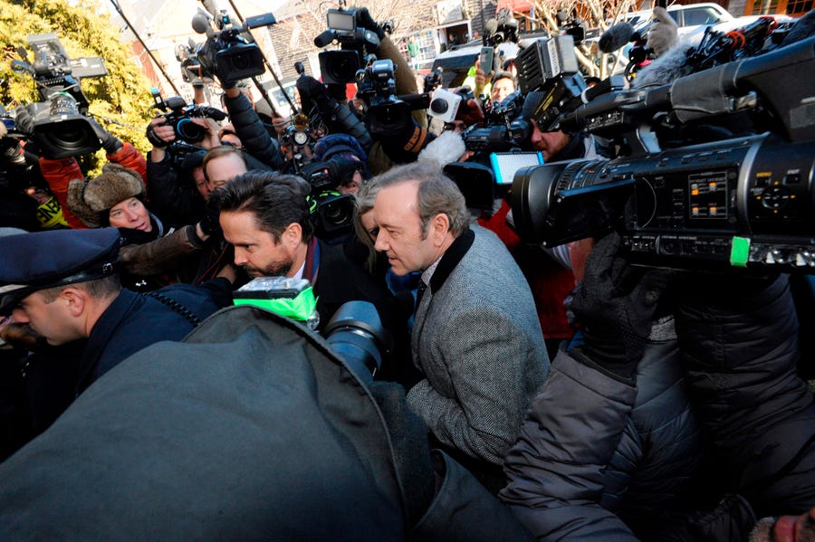 Kevin Spacey and his lawyer Alan Jackson wade through a media frenzy for his arraignment on Jan. 7, 2019 at the Nantucket District Court, on Nantucket, Mass.
