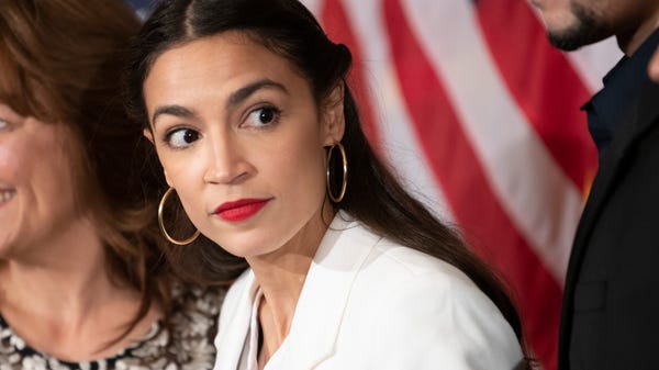 Rep. Alexandria Ocasio-Cortez, D-N.Y., awaits her...