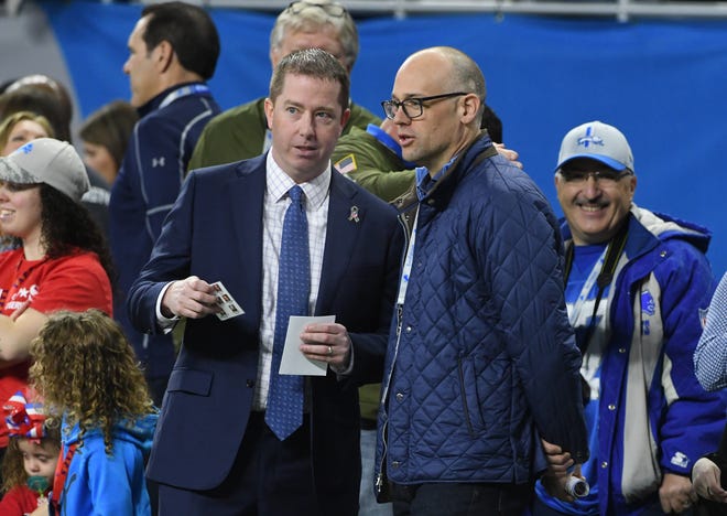 Lions general manager Bob Quinn, with Wings head coach  Jeff Blashill on the sideline during a game this year, 
says the team is playing a more physical brand of football than it did early his tenure with Lions.