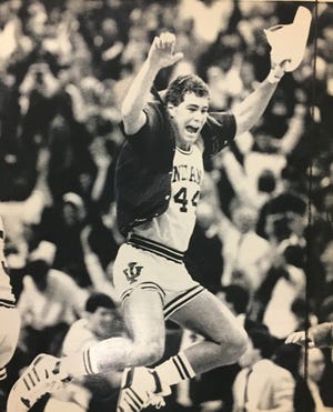 Joe Hillman jumps for joy following IU's win in the final of the NCAA Midwest Regional over LSU on March 22, 1987.