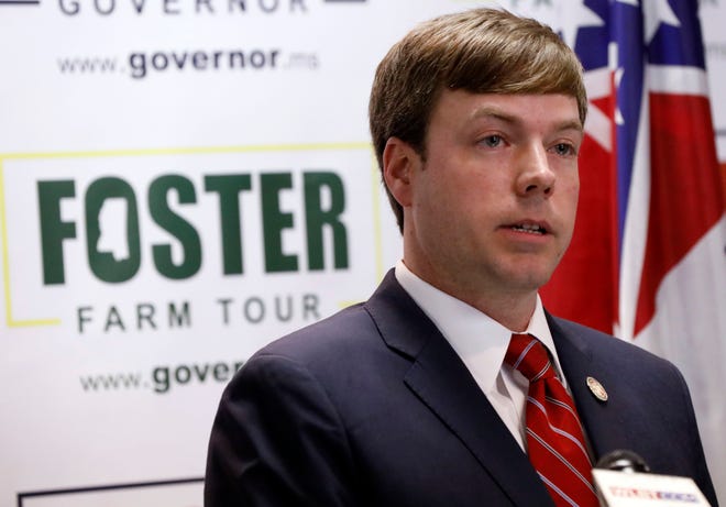 State Rep. Robert Foster, R-Hernando, speaks with reporters as he discusses his reasons for running for governor of Mississippi, Tuesday, Jan. 8, 2019, at the state GOP headquarters in Jackson, Miss.