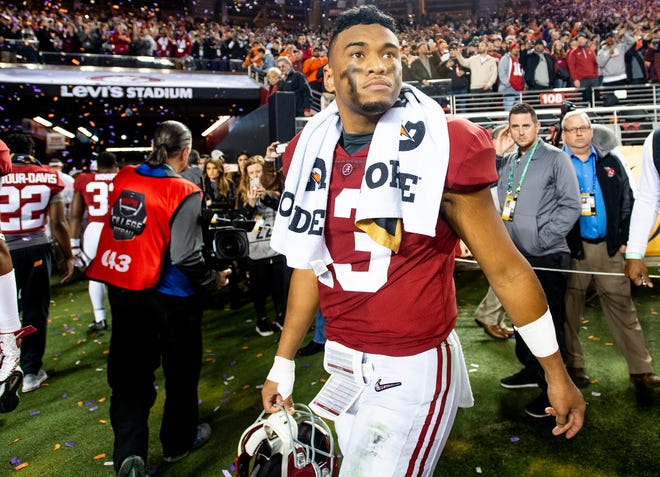 Alabama quarterback Tua Tagovailoa (13) walks off the field after losing to Clemson in the College Football Playoff National Championship game at Levi's Stadium in Santa Clara, Ca., on Monday January 7, 2019. 
