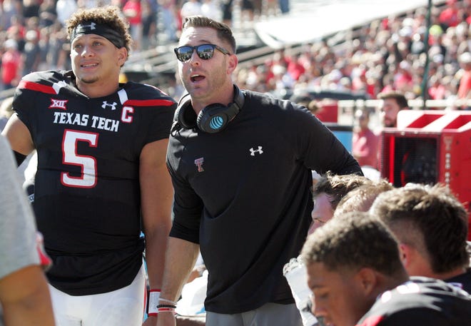 Kliff Kingsbury (R) and quarterback Patrick Mahomes, seen during their days together at Texas Tech, when Kingsbury was head coach.