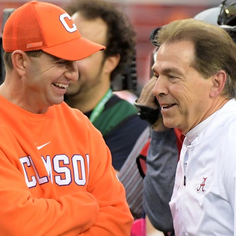 Dabo Swinney and Nick Saban share a laugh before t