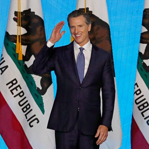 California Governor Gavin Newsom gestures after...