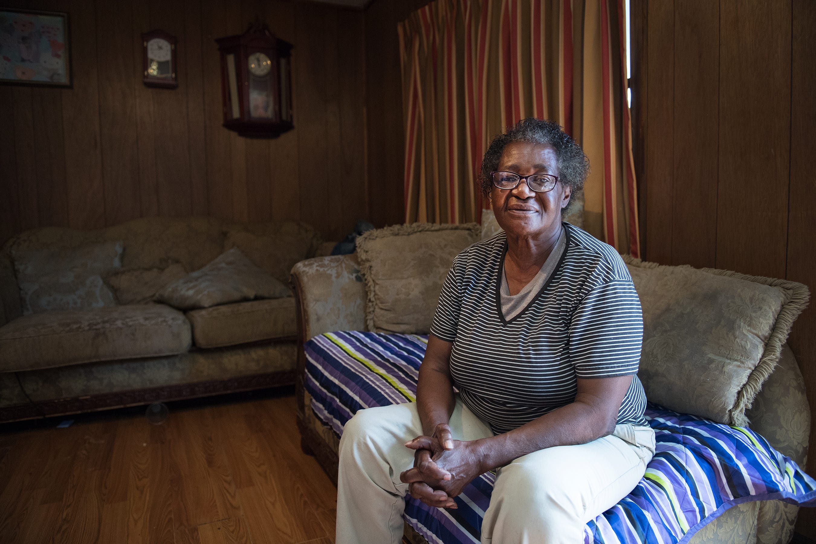 Ella Bromell sits in her home in Conway on Feb. 21, 2018. These days, she rarely leaves her yard — she said she lives in fear of losing her 1,000-square-foot home. She’s endured years of efforts by the city of Conway to seize her house, an attempt to shut down drug dealers by going after Bromell.