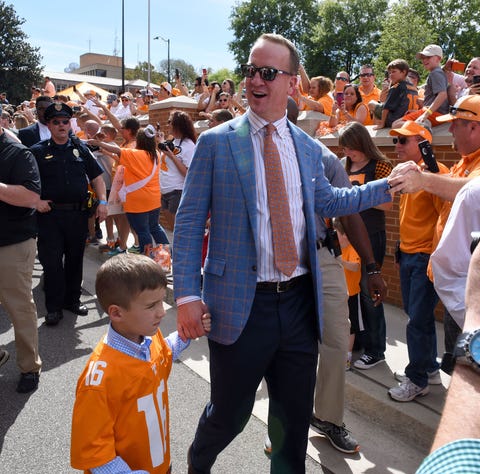 Peyton Manning and son Marshall during the Vol Wal