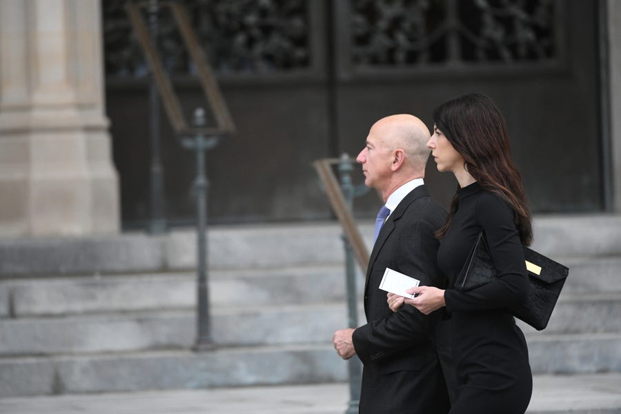 Jeff Bezos and his wife MacKenzie Bezos approached the National Cathedral in Washington for a memorial service for John McCain on Sept. 1, 2018.