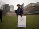 PHILADELPHIA, PA - JANUARY 08:  David Fitzpatrick, 64, a Park Ranger, holds an American flag and a placard stating "You're fired" with "Smokey the Bear," after a protest rally with furloughed federal workers and area elected officials in front of Independence Hall on January 8, 2019 in Philadelphia, Pennsylvania.  The government shutdown, now lasting 18 days, marks the second longest United States in history, affecting about 800,000 federal employees.  (Photo by Mark Makela/Getty Images) ORG XMIT: 775278689 ORIG FILE ID: 1079379668