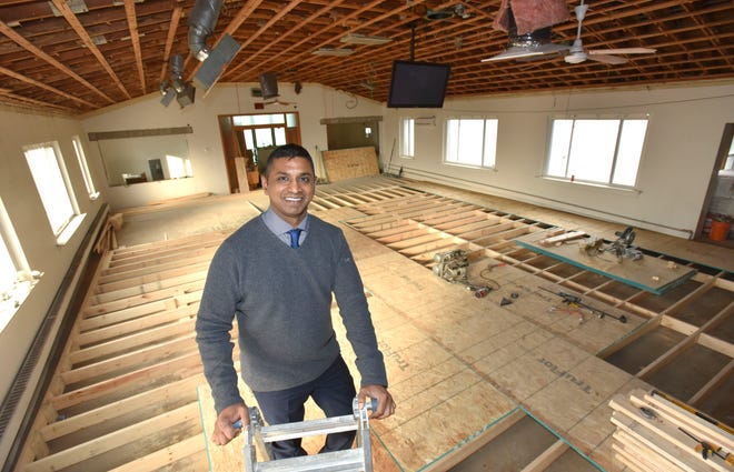 Life Lab Kids founder Jai Reddy stands in the sanctuary of a former church in Ferndale that's being transformed into a gym.