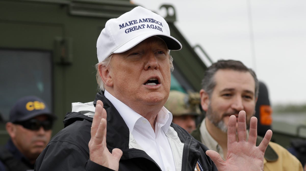 President Donald Trump speaks as he tours the U.S. border with Mexico at the Rio Grande on the southern border, Thursday, Jan. 10, 2019, in McAllen, Texas, as Sen. Ted Cruz, R-Texas, listens at right.