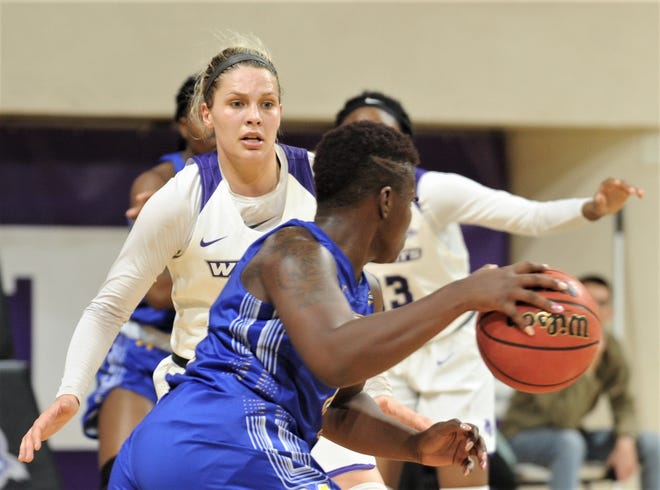 ACU's Lexie Ducat defends against a McNeese player during a Southland Conference game Wednesday, Jan. 9, 2019, at Moody Coliseum. ACU won 109-52.