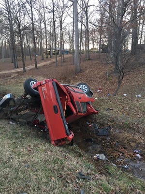 Two people were injured in a crash in Hardin County that left two vehicles overturned in ditches beside State Route 57.