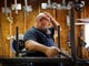 Jack Lyons, a contractor working on massive rocket test stands for NASA, stands in his workshop while spending the furlough on his small side business making props for marching bands, in Madison, Ala., Jan. 8, 2019. "They're trying to use people as bargaining chips, and it just isn't right," Lyons said. Unlike civil service workers who expect to eventually get back pay, Lyons doesn't know if he'll ever see a dollar from the shutdown period.