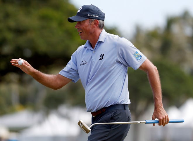 Matt Kuchar reacts to making a birdie putt on the first green during the third round of the Sony Open golf tournament Saturday.
