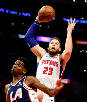 Detroit Pistons' Blake Griffin, right, goes to basket against Los Angeles Clippers' Shai Gilgeous-Alexander during the second half.