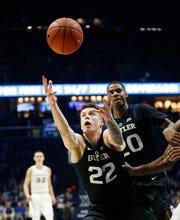 Jan 13, 2019; Cincinnati, OH, USA; Butler Bulldogs forward Sean McDermott (22) goes for the ball during the first half against the Xavier Musketeers at the Cintas Center.