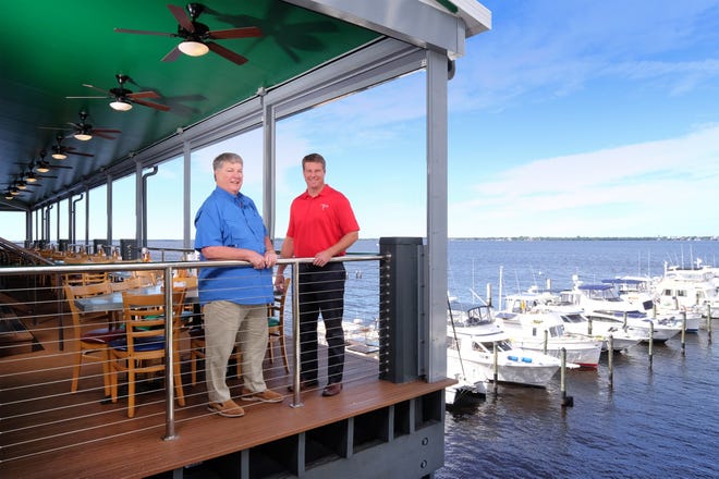 Tony Phelan, left, and his son Grant Phelan own Phelan Family Brands, the company behind Pinchers, Deep Lagoon Seafood and Texas Tony's Rib & Brewhouse.