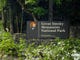 Storm damage is seen at the entrance to the Great Smoky Mountains National Park Friday in Townsend. Two park visitors were killed and others injured by a violent storm that swept through the Cades Cove area Thursday evening. (J. Miles Cary/News Sentinel)   