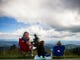 Bob and Sandra Farrell of Knoxville sit with their great-grandson who they are raising, Neo Waller, 6, in Great Smoky Mountains National Park near Clingmans Dome on Saturday, Sept. 3, 2016. It was Neo's first time in the mountains. (CAITIE MCMEKIN/NEWS SENTINEL)
