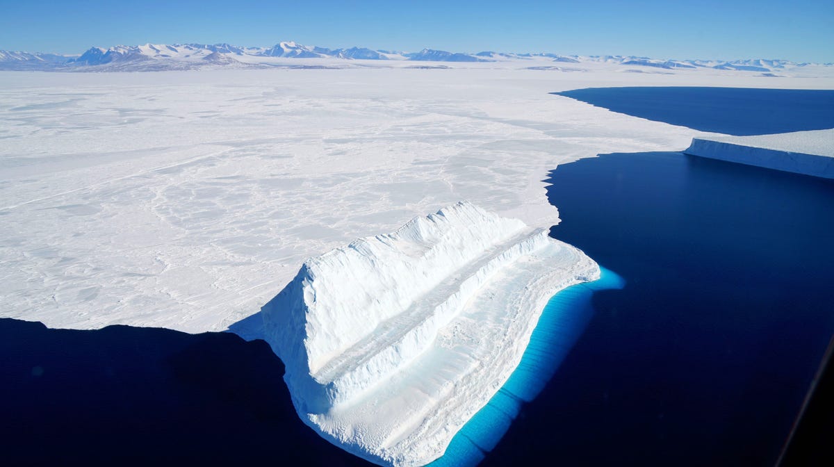 An iceberg floats in Antarctica's McMurdo Sound. Global warming is melting ice in Antarctica faster than ever before -- about six times more per year now than 40 years ago -- leading to increasingly high sea levels worldwide, scientists warned on January 14, 2019.