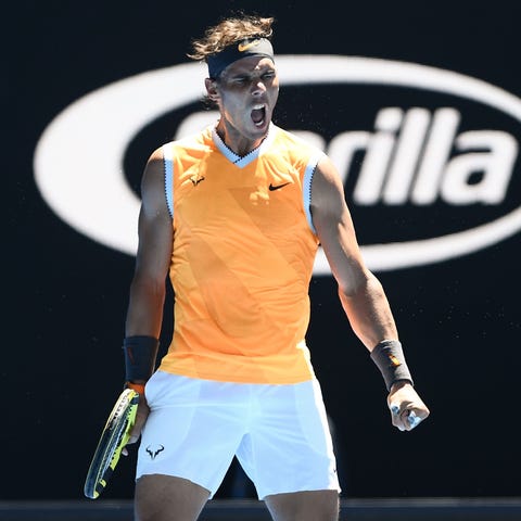 Rafael Nadal reacts after a point against James...