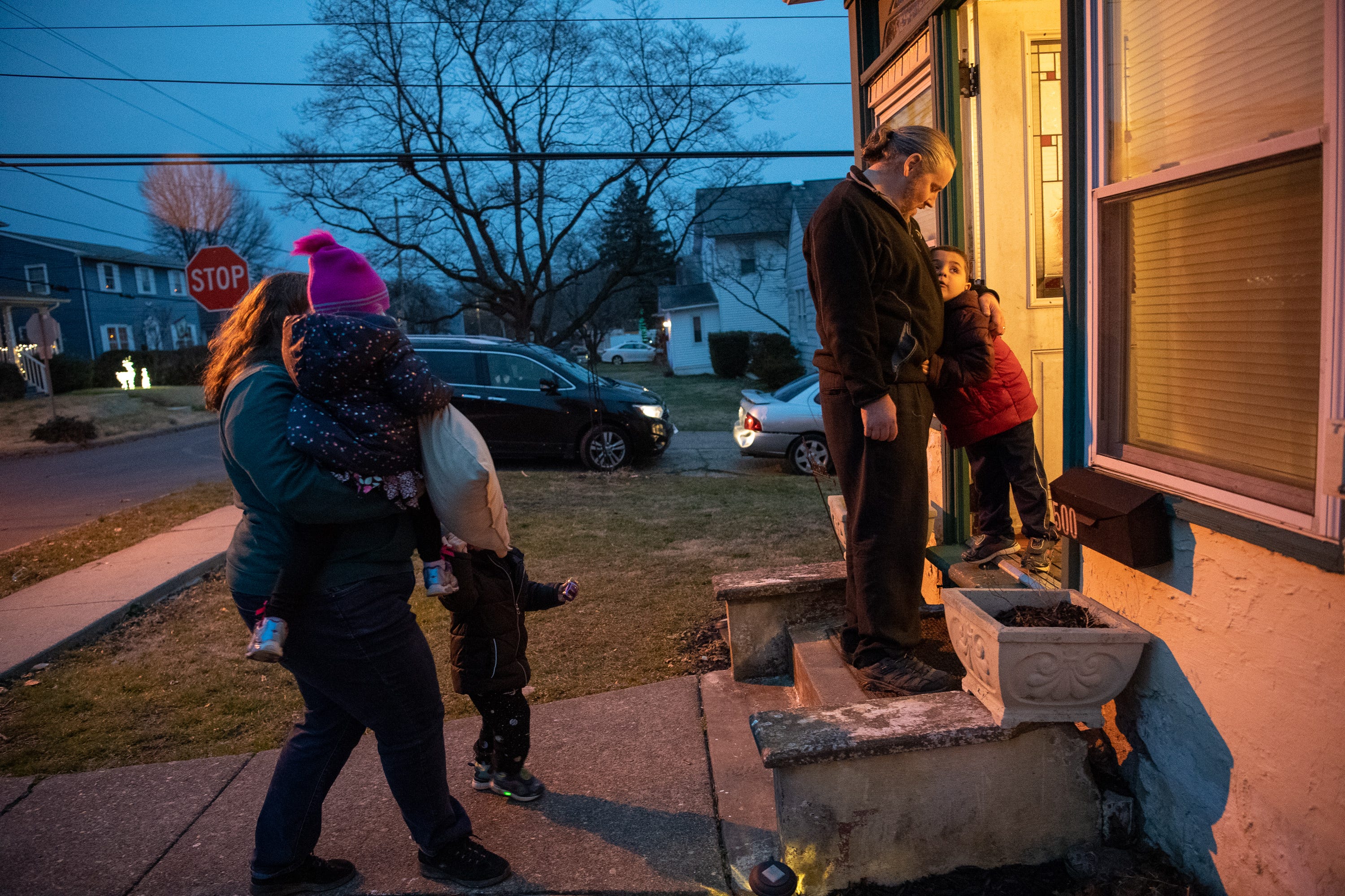 Bill and Trish Kinkle arrive at their new home after picking their three kids up from daycare in Willow Grove, PA.