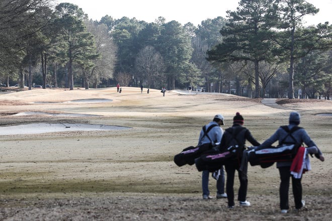 January 15 2019 - Golfers make their way up the fairway while playing at the Germantown Country Club. The Germantown Country Club is closing next month, but a group of members are trying to get together the money needed to purchase the club and keep it open as a golf club.
