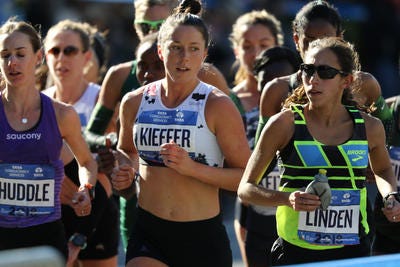 Allie Kieffer, center, runs between Molly Huddle and Desiree Linden at the 2018 New York City Marathon. Kieffer was seventh, one place behind fellow former Arizona State runner Linden.