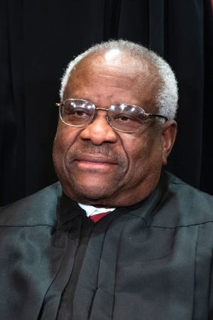 Associate Justice Clarence Thomas wrote the Supreme Court's 5-4 opinion upholding a criminal defendant's enhanced sentence for a gun crime.