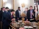 Guests select fast food Donald Trump purchased for a ceremony honoring the 2018 College Football Playoff National Champion Clemson Tigers in the State Dining Room of the White House, Monday.