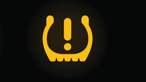 Tire pressure symbol.