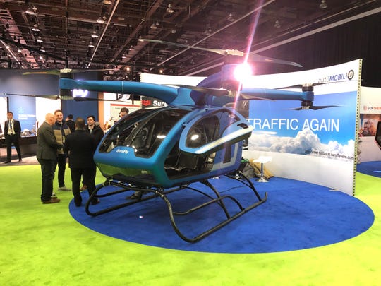 The Surefly Octocopter on the floor of the Detroit auto show