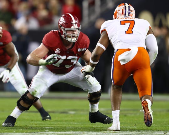 Alabama Crimson Tide tackle Jonah Williams (73) blocks against Clemson Tigers defensive end Austin Bryant (7).