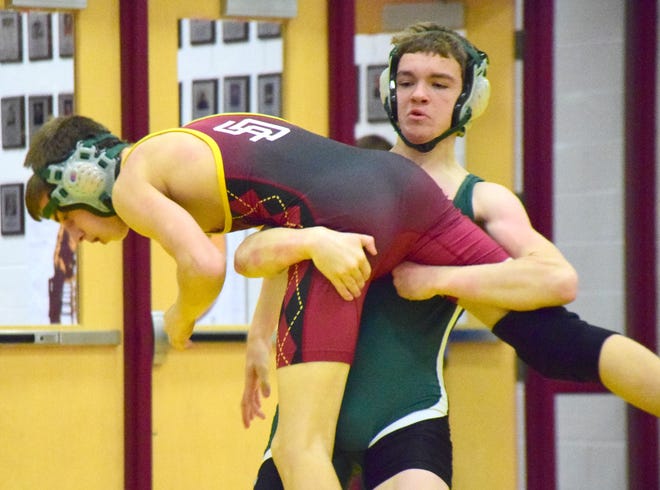 Wilson Memorial’s Matthew Holmes gets control of Stuarts Draft’s Owen Gray during their 126-pound quarterfinal bout at the 30th News Leader Wrestling Tournament at Stuarts Draft High School in Stuarts Draft, Va., on Tuesday, Jan. 15, 2019.