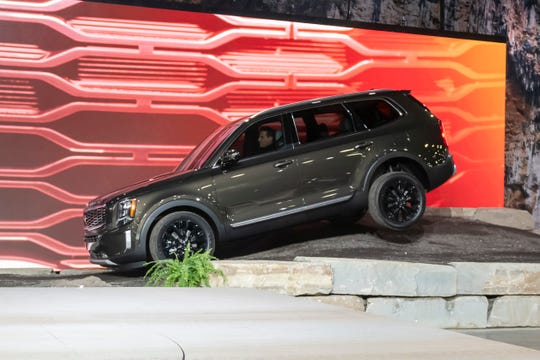 The 2020 Kia Telluride is driven on an off-road road course during its reveal.