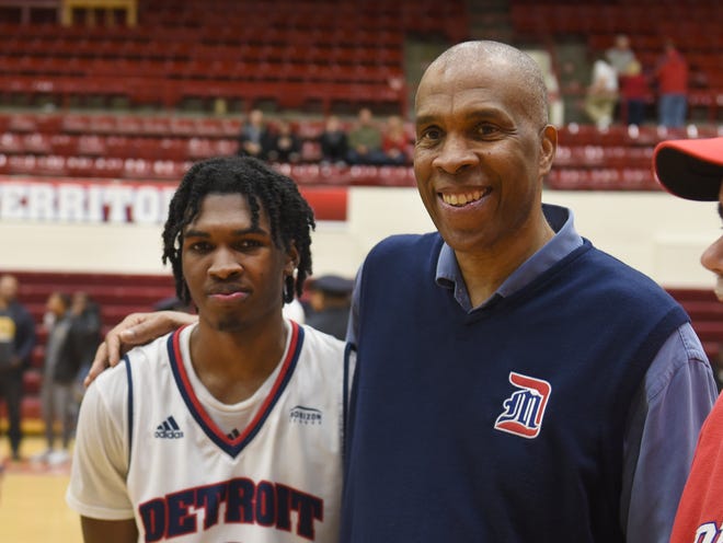 Antoine Davis, left, and his father Mike Davis, Detroit Mercy's first-year head coach.