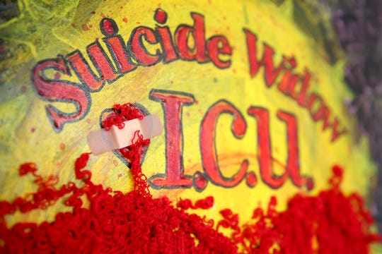 Marlie Rowell creates art from her husband's clothing to speak out about the grief and stigma surrounding his death by suicide nine years ago. Photographed at her home in Salem on Thursday, Jan. 17, 2019.