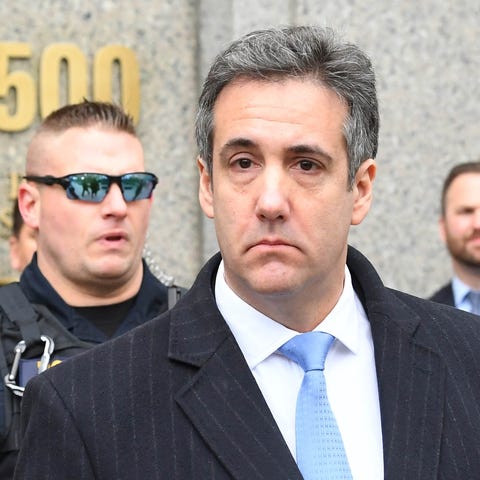 Michael Cohen departs after sentencing at the...