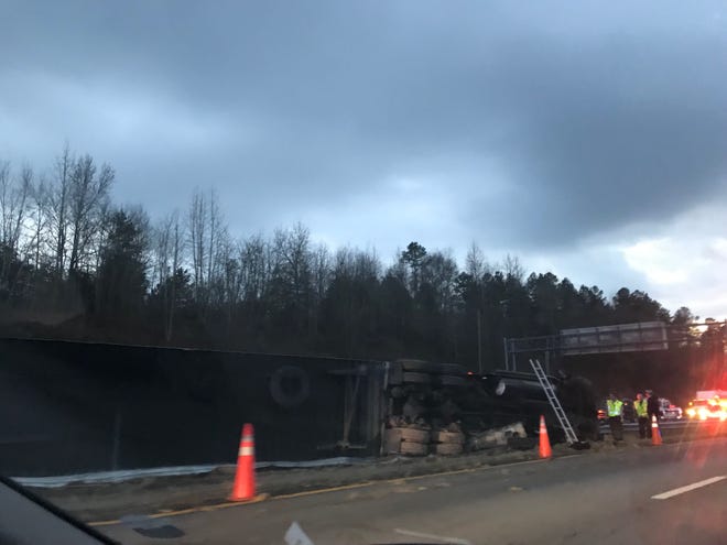 A tractor-trailer has flipped over, backing up traffic on Interstate 85 in Walhalla.