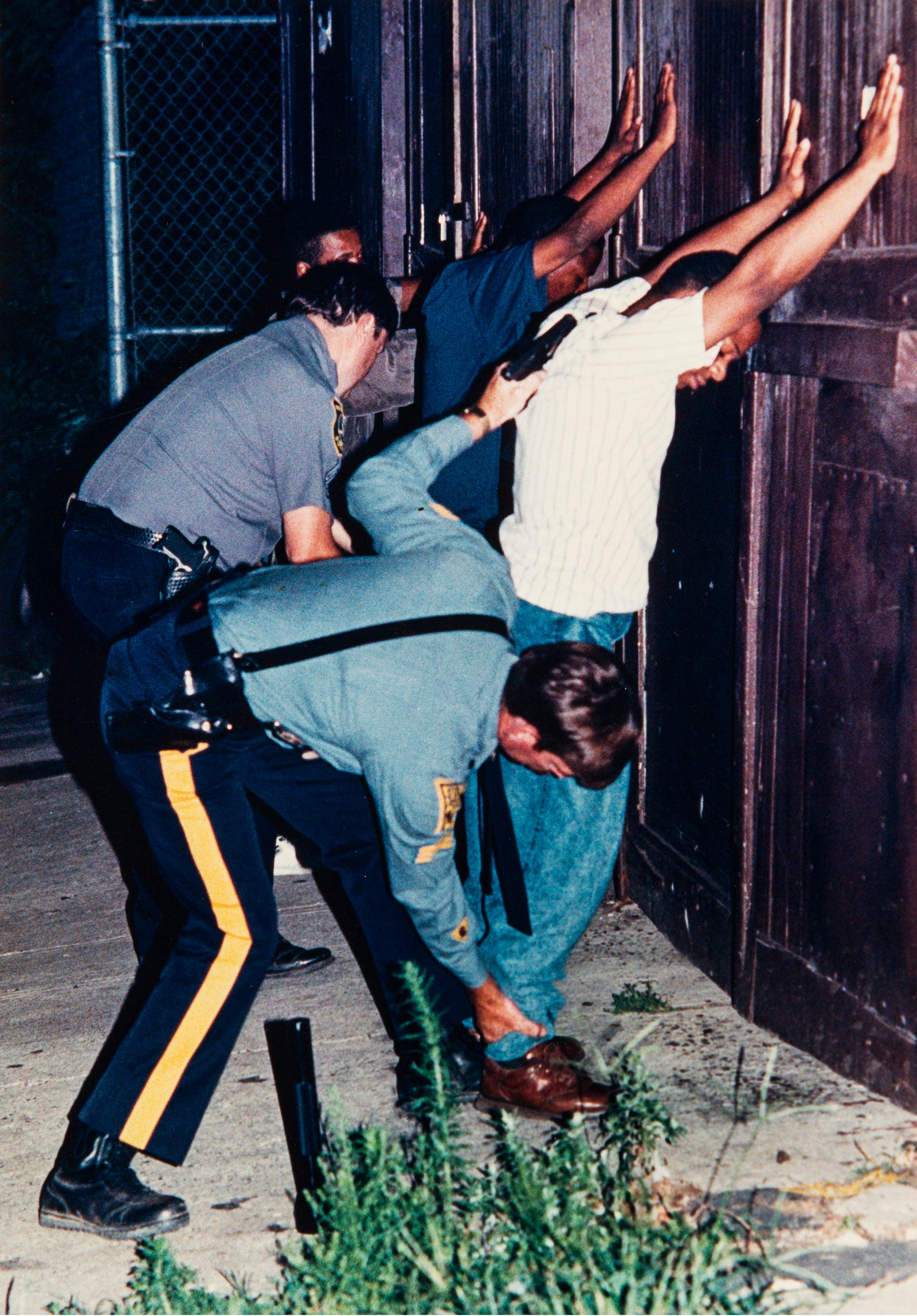 Suspects being taken into custody in Newark in 1990.