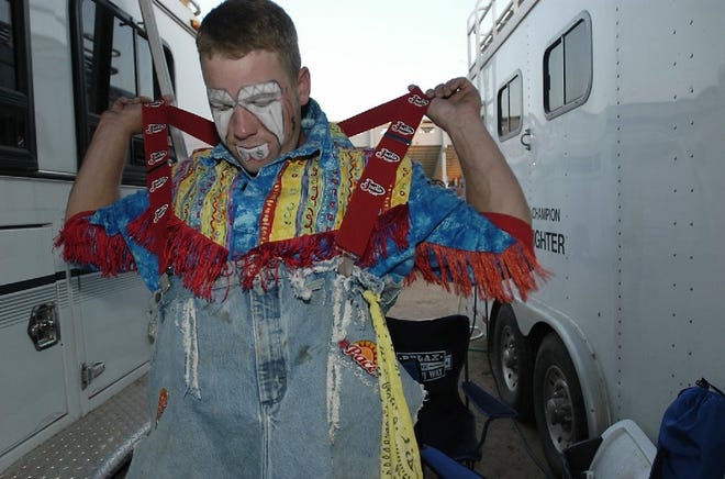 Severance rodeo bullfighter Lance Brittan, shown in this file photo preparing for the Greeley Stampede, was saddened after hearing of the death of bull rider Mason Lowe on Tuesday.