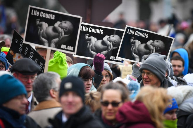 Thousands of anti-abortion activists, including many young people bundled up against the cold weather gripping the nation's capital, gathered at a stage on the National Mall last month for their annual march in the long-contentious debate over abortion.