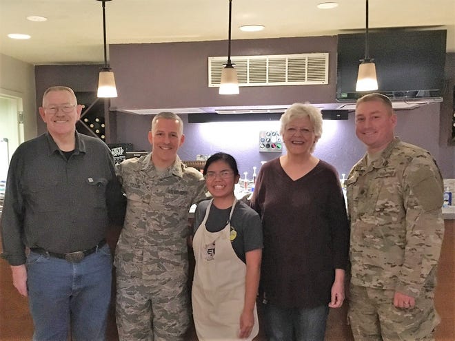 Airman 1st Class Femke Vargas, Refuel Cafe volunteer, was coined for excellent wingmanship, Oct. 5, 2018, at the Refuel Cafe on Holloman Air Force Base, N.M. Through making handcrafted beverages at her new home away from home, Vargas found her stride, improving the morale of other Airmen and developing leadership skills.
