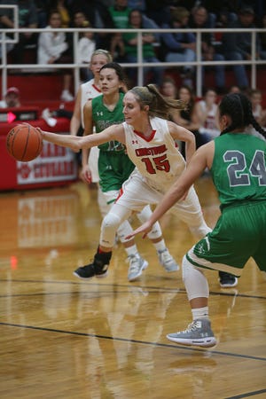 Christoval's Kayce Jackson (15) is surrounded by Eldorado Lady Eagles as she tries to gain control of the ball Friday, Jan. 18, 2019 in Christoval. 